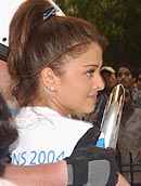Bollywood actress Aishwarya Rai carries the Olympic torch through Janpath  in Delhi on Thursday.