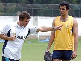Physical trainer Gregory Allen King gives tips to Zaheer Khan at the pace bowlers' camp in Bangalore