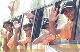 Children of the Bakkarwal tribe wave as they leave for Bharat Darshan organised by Army Akhnoor sector, near Jammu, on Thursday