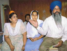 Roopinder Kaurs father Kuldip Singh, mother Manjit Kaur and aunt at their house
