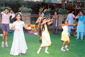 Participants at a summer camp in Pumpkins Kindergarten present a dance item in Ludhiana