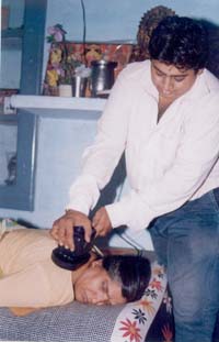 Dr Rajeev Gupta from Osho Commune Centre demonstrates techniques of acupressure on a patient at Nature Cure Camp that started on Sunday
