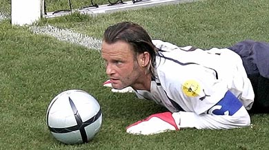 Switzerlands goalkeeper Joerg Stiel looks up after he stopped the ball with his head after scrambling back to the goalmouth during Group B Euro 2004 soccer match
