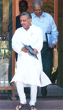 Union Petroleum and Natural Gas Minister Mani Shankar Aiyar and his Secretary B.K. Chaturvedi come out of PMO 