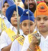 Members of the "Bir Khalsa Dal" take part in a nagar kirtan in Ludhiana 