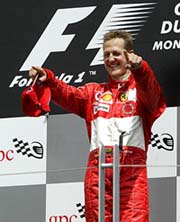 Ferrari driver Michael Schumacher celebrates his win