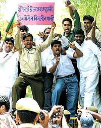 BJP activists protest against the recent price hike in electricity at Parliament Street in the Capital on Tuesday