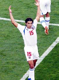 Czech Republic's Milan Baros celebrates after scoring against Latvia during their group D Euro 2004 first round match at Aveiro, Portugal