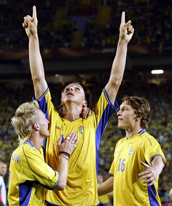 Sweden's Zlatan Ibrahimovic is congratulated by team-mates