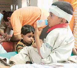 Four-year-old Asif, who was injured in the Matsyagandha Express accident, undergoes treatment at a government hospital.