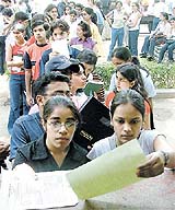 Admission seekers submit their forms on the last date at Hindu College in Delhi University on Wednesday
