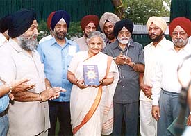 Delhi Chief Minister Sheila Dikshit releasing the book, Guru Angad Dev Ji Jeewan Te Bani, in the Capital
