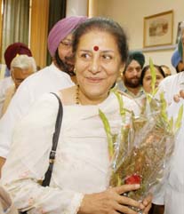 ongress General Secretary Ambika Soni smiles after filing her nomination papers for the Rajya Sabha elections