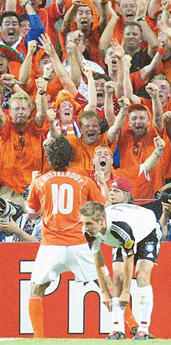 Ruud van Nistelrooy of the Netherlands celebrates with fans