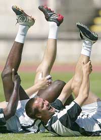 England's Michael Owen laughs during a practice session in Lisbon on Tuesday. 