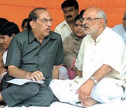 Delhi BJP leaders Vijay Kumar Malhotra and Sahib Singh Verma take part in a dharna at Raj Ghat in the Capital 