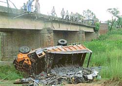 The truck which fell into a seasonal rivulet on the Ambala-Jagadhri road on Thursday night.