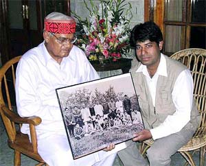 Former Prime Minister Atal Bihari Vajpayee receives his 40-year-old photograph