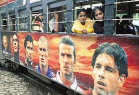 A tram is decorated by faces of Euro Championship heroes
