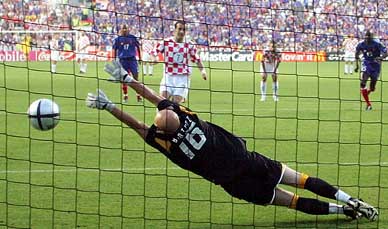 France's goalkeeper Fabien Barthez fails to stop a penalty kick from Croatia's Milan Rapaic