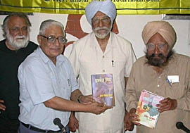 Mr H.K. Dua, Editor-in-Chief of The Tribune, unveils Punjabi translations of Khushwant Singhs autobiography and novel at the Press Club in Chandigarh on Saturday. Also seen in the picture are Khushwant Singhs son Rahul Singh (extreme left) and former Governor of Kerala Justice S.S Kang. 
