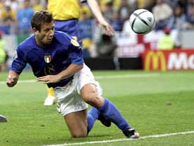 Italy's Antonio Cassano scores against Sweden during their Group C match at Porto's Dragao stadium