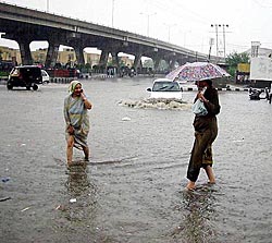 Roads in Jammu city were flooded after a heavy downpour 