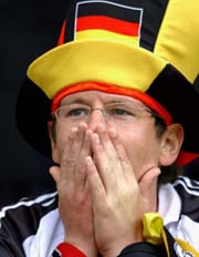 A German supporter looks dejected in the stands after his team drew 0-0 with Latvia