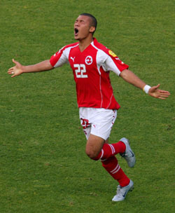 Switzerland's Johann Vonlanthen celebrates his goal during their group B match against France in Coimbra