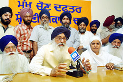 Former Chief Minister Parkash Singh Badal talks to mediapersons after inaugurating the Shiromani Akali Dals election office in Jalandhar on Tuesday