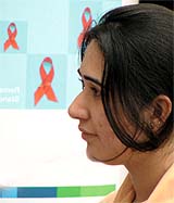 A girl participates in a street play on AIDS awareness at Connaught Place in the Capital on Thursday