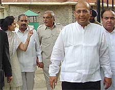 Kiran Choudhary, Congress candidate for the Rajya Sabha, R.K. Dhawan, Bhupendra Singh Hooda, Manu Singhvi, Capt Ajay come out from the Election Commission office 