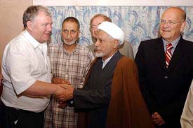 The APHC Chairman, Moulvi Abbas Ansari, receiving the head of a delegation of the European Union Parliamentarians