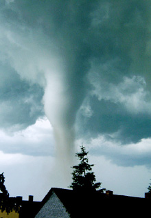A tornado forms in the sky above Aken