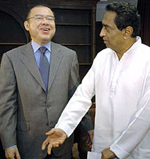 World Trade Organisation chief Supachai Panitchpakdi (L) smiles as he talks to Indian Commerce Minister Kamal Nath prior to a meeting in New Delhi on Friday. Mr Panitchpakdi said he still hoped an agreement could be reached by next month on reopening free-trade negotiations but that disputes lingered after liberalisation talks broke down in September at a ministerial-level meeting in Cancun, Mexico.