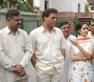 Kiran Chaudhary, Congress candidate for the Rajya Sabha from Haryana, with Jagdish Singh Sangwan and Karan Dalal coming out from the Supreme Court after the hearing of Congress MLAs on disqualification in New Delhi on Friday