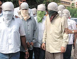 THE UGLY FACE OF CRIME:  Seven dacoits held by the Crime Branch in the Capital on Friday.