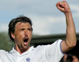 Croatia's Goran Ivanisevic celebrates after breaking the serve of Italy's Filippo Volandri