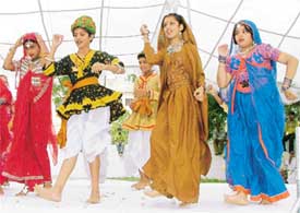 Children present a dance during a function to mark the International Day Against Drug Abuse at the Bal Bhavan
