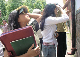 Anxious DU students examining the cut-off list in the Capital on Saturday. 
