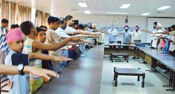 Participants take oath during a seminar held to mark the International Anti-Drug Day in Ludhiana