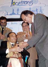 Film producer/director  B. R. Chopra being felicitated by Union Minister for Sports