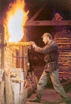 Nick Rees stoking up the wood-fired kiln