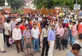 Protesting candidates outside one of the examination centres, GGDSD College, Sector 32, in Chandigarh