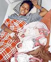 Nisha with her triplets in Ambala on Sunday