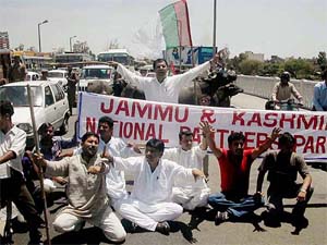 Jammu and Kashmir National Panthers Party activists protest against Fridays killing of 12 persons at Surankote in Jammu on Sunday