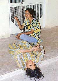 Two sisters, Yasmeen and Tasneem, who allegedly killed their father, at a women's police station in Bhopal on Sunday. 