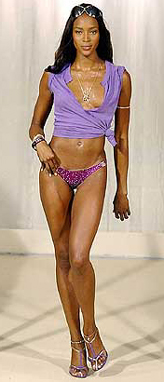 British supermodel Naomi Campbell walks down the ramp at the Dolce & Gabbana Mens Fashion Collection for the Spring/Summer 2005, unveiled in Milan