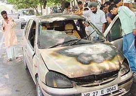 A car caught fire on Madhya Marg in Sector 27, Chandigarh