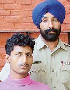 Dharminder Kumar who has been arrested with 1.95 kg of ganja in Chandigarh